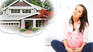Woman dreaming about house holding piggy bank.